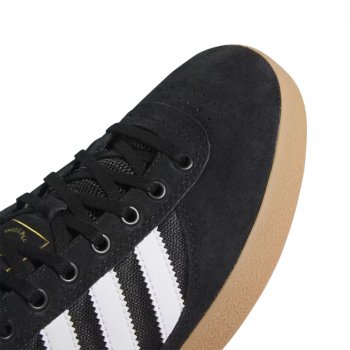Adidas Puig Indoor black/white/gum Schuhe